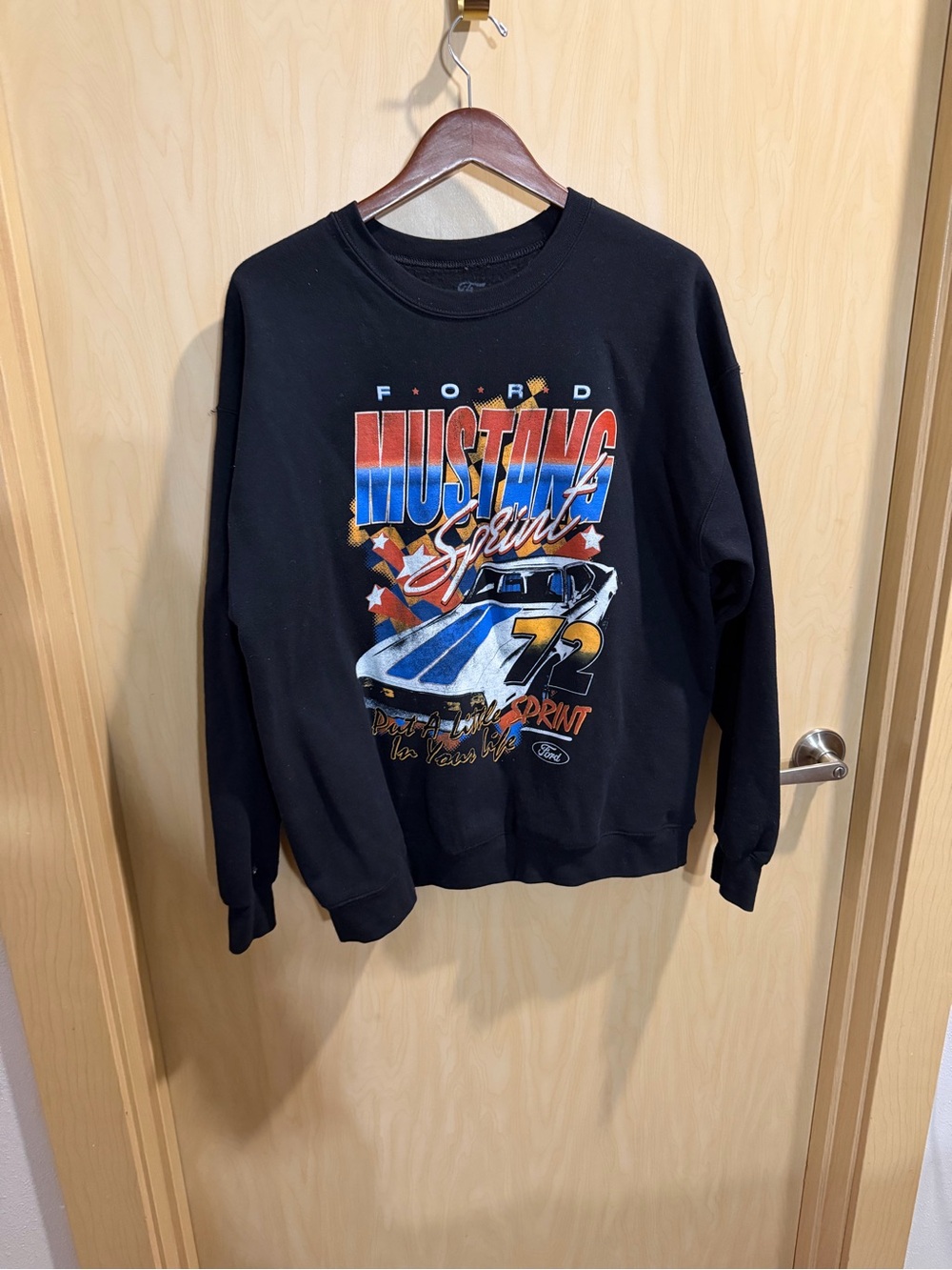 Ford Black Crewneck Sweatshirt with Vintage Multicolor Mustang Graphic